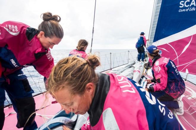 Team SCA - The team organise the sails after a sail change - Volvo Ocean Race 2014-15 © Anna-Lena Elled/Team SCA